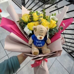 Ramo de 9 rosas con Osito Parche